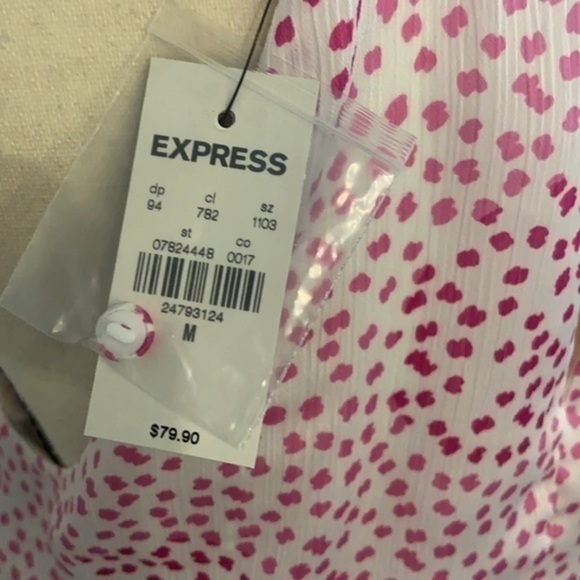 Dotted high neck, asymmetrical fit and flare dress​ - Picture 6 of 6